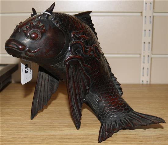 A Japanese brown patinated bronze model of a carp, 19th century, height 18.5cm